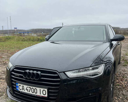 Черный Ауди А6, объемом двигателя 2 л и пробегом 122 тыс. км за 24000 $, фото 1 на Automoto.ua