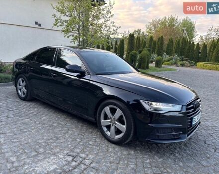 Черный Ауди А6, объемом двигателя 1.97 л и пробегом 257 тыс. км за 19999 $, фото 1 на Automoto.ua