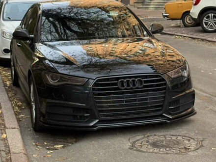 Черный Ауди А6, объемом двигателя 2 л и пробегом 152 тыс. км за 18500 $, фото 1 на Automoto.ua