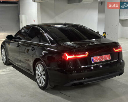 Чорний Ауді А6, об'ємом двигуна 2 л та пробігом 259 тис. км за 14300 $, фото 1 на Automoto.ua