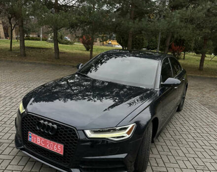 Черный Ауди А6, объемом двигателя 1.98 л и пробегом 185 тыс. км за 17999 $, фото 1 на Automoto.ua