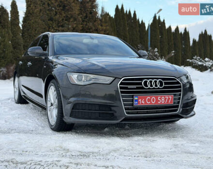 Черный Ауди А6, объемом двигателя 2 л и пробегом 200 тыс. км за 15500 $, фото 1 на Automoto.ua