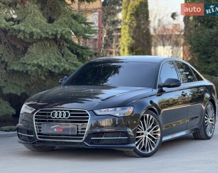 Черный Ауди А6, объемом двигателя 2 л и пробегом 156 тыс. км за 16500 $, фото 1 на Automoto.ua