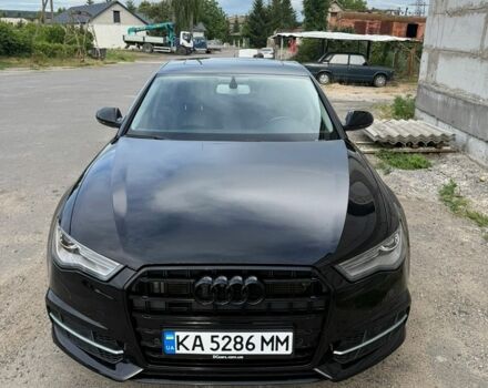 Чорний Ауді А6, об'ємом двигуна 1.98 л та пробігом 105 тис. км за 18500 $, фото 1 на Automoto.ua