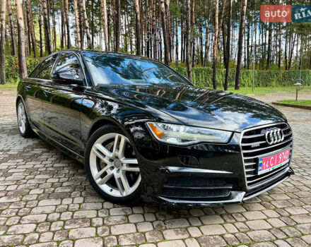 Черный Ауди А6, объемом двигателя 2 л и пробегом 141 тыс. км за 23000 $, фото 1 на Automoto.ua
