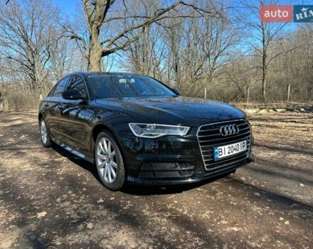 Черный Ауди А6, объемом двигателя 1.98 л и пробегом 128 тыс. км за 20500 $, фото 1 на Automoto.ua