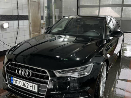 Черный Ауди А6, объемом двигателя 2 л и пробегом 130 тыс. км за 24800 $, фото 1 на Automoto.ua