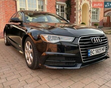 Черный Ауди А6, объемом двигателя 1.98 л и пробегом 64 тыс. км за 14500 $, фото 1 на Automoto.ua