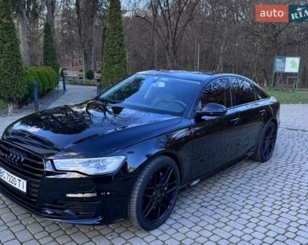 Черный Ауди А6, объемом двигателя 1.98 л и пробегом 72 тыс. км за 20400 $, фото 1 на Automoto.ua