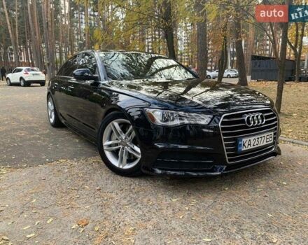 Черный Ауди А6, объемом двигателя 1.98 л и пробегом 200 тыс. км за 19000 $, фото 1 на Automoto.ua