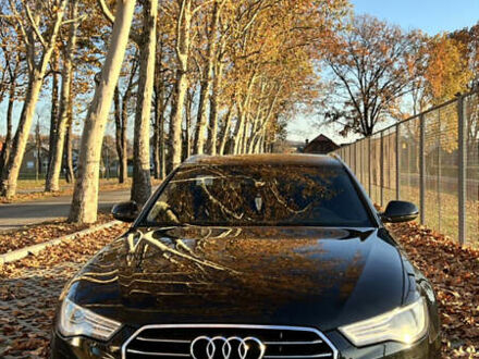 Черный Ауди А6, объемом двигателя 2 л и пробегом 243 тыс. км за 18000 $, фото 1 на Automoto.ua