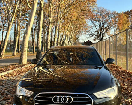 Черный Ауди А6, объемом двигателя 2 л и пробегом 243 тыс. км за 18000 $, фото 1 на Automoto.ua