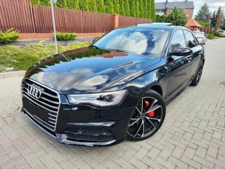 Черный Ауди А6, объемом двигателя 2 л и пробегом 117 тыс. км за 12700 $, фото 1 на Automoto.ua
