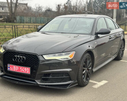 Черный Ауди А6, объемом двигателя 1.98 л и пробегом 86 тыс. км за 18800 $, фото 1 на Automoto.ua