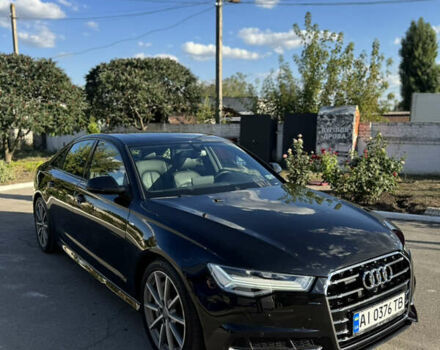 Чорний Ауді А6, об'ємом двигуна 1.98 л та пробігом 76 тис. км за 22500 $, фото 1 на Automoto.ua
