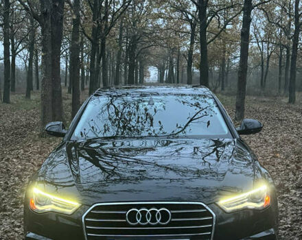 Черный Ауди А6, объемом двигателя 2 л и пробегом 143 тыс. км за 25000 $, фото 1 на Automoto.ua