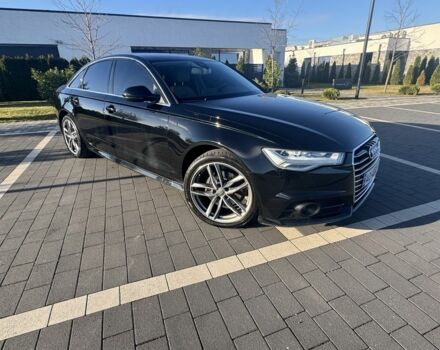 Черный Ауди А6, объемом двигателя 2 л и пробегом 118 тыс. км за 25500 $, фото 1 на Automoto.ua