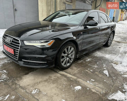 Черный Ауди А6, объемом двигателя 2 л и пробегом 127 тыс. км за 18950 $, фото 1 на Automoto.ua
