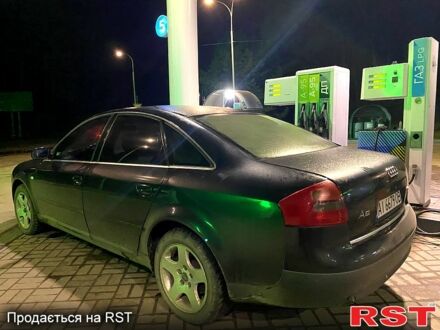 Фиолетовый Ауди А6, объемом двигателя 1.9 л и пробегом 225 тыс. км за 3500 $, фото 1 на Automoto.ua