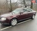 Красный Ауди А6, объемом двигателя 1.8 л и пробегом 320 тыс. км за 4200 $, фото 1 на Automoto.ua