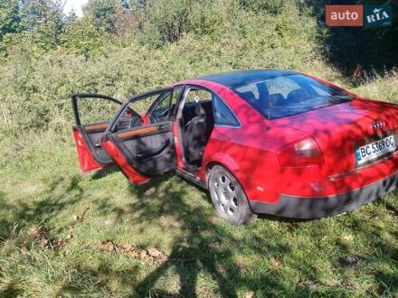 Красный Ауди А6, объемом двигателя 2.39 л и пробегом 249 тыс. км за 4500 $, фото 1 на Automoto.ua