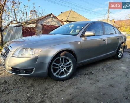 Сірий Ауді А6, об'ємом двигуна 2 л та пробігом 298 тис. км за 7500 $, фото 1 на Automoto.ua
