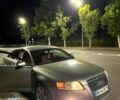 Серый Ауди А6, объемом двигателя 2 л и пробегом 312 тыс. км за 5600 $, фото 1 на Automoto.ua