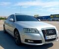 Серый Ауди А6, объемом двигателя 2 л и пробегом 253 тыс. км за 7199 $, фото 1 на Automoto.ua