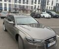 Сірий Ауді А6, об'ємом двигуна 2 л та пробігом 230 тис. км за 10250 $, фото 1 на Automoto.ua