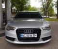 Сірий Ауді А6, об'ємом двигуна 1.98 л та пробігом 250 тис. км за 12900 $, фото 1 на Automoto.ua