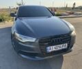 Сірий Ауді А6, об'ємом двигуна 2 л та пробігом 217 тис. км за 13999 $, фото 1 на Automoto.ua