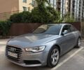 Сірий Ауді А6, об'ємом двигуна 2 л та пробігом 214 тис. км за 11500 $, фото 1 на Automoto.ua