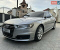 Сірий Ауді А6, об'ємом двигуна 2 л та пробігом 235 тис. км за 14999 $, фото 1 на Automoto.ua