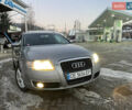 Серый Ауди А6, объемом двигателя 2 л и пробегом 255 тыс. км за 6500 $, фото 1 на Automoto.ua