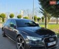 Сірий Ауді А6, об'ємом двигуна 1.97 л та пробігом 235 тис. км за 12999 $, фото 1 на Automoto.ua