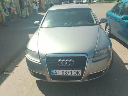 Серый Ауди А6, объемом двигателя 2.4 л и пробегом 322 тыс. км за 6500 $, фото 1 на Automoto.ua