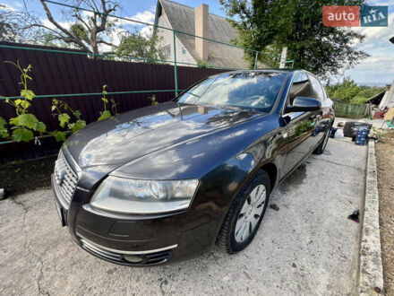 Серый Ауди А6, объемом двигателя 2.39 л и пробегом 332 тыс. км за 6700 $, фото 1 на Automoto.ua