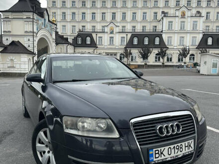 Серый Ауди А6, объемом двигателя 2.4 л и пробегом 270 тыс. км за 7400 $, фото 1 на Automoto.ua