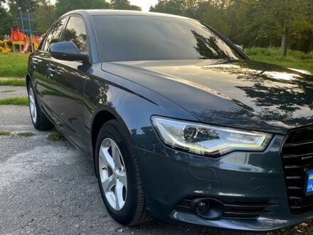 Сірий Ауді А6, об'ємом двигуна 2 л та пробігом 295 тис. км за 13900 $, фото 1 на Automoto.ua