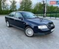 Синий Ауди А6, объемом двигателя 1.8 л и пробегом 429 тыс. км за 3400 $, фото 1 на Automoto.ua