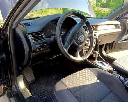 Синий Ауди А6, объемом двигателя 2.4 л и пробегом 317 тыс. км за 4500 $, фото 5 на Automoto.ua