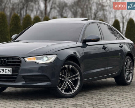 Синий Ауди А6, объемом двигателя 2 л и пробегом 200 тыс. км за 13950 $, фото 1 на Automoto.ua
