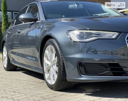 Синій Ауді А6, об'ємом двигуна 2 л та пробігом 229 тис. км за 23500 $, фото 1 на Automoto.ua