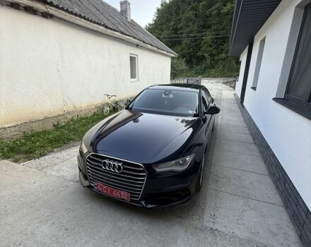 Синій Ауді А6, об'ємом двигуна 2 л та пробігом 187 тис. км за 18900 $, фото 1 на Automoto.ua