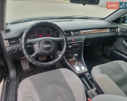 Синий Ауди А6, объемом двигателя 2.4 л и пробегом 388 тыс. км за 4250 $, фото 3 на Automoto.ua