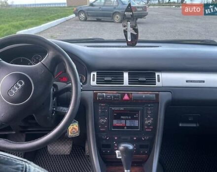 Синий Ауди А6, объемом двигателя 2.5 л и пробегом 275 тыс. км за 5500 $, фото 16 на Automoto.ua