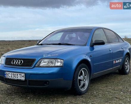 Синий Ауди А6, объемом двигателя 2.4 л и пробегом 271 тыс. км за 5000 $, фото 1 на Automoto.ua