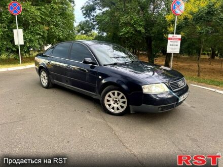 Синий Ауди А6, объемом двигателя 2.4 л и пробегом 230 тыс. км за 2800 $, фото 1 на Automoto.ua