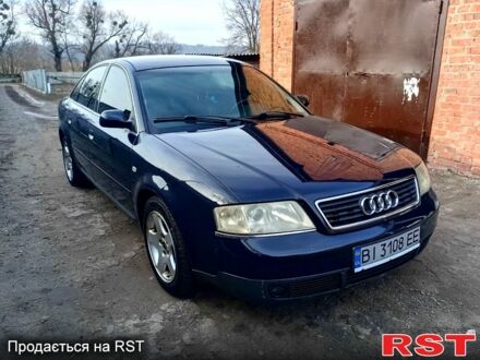 Синий Ауди А6, объемом двигателя 2.5 л и пробегом 300 тыс. км за 4500 $, фото 1 на Automoto.ua