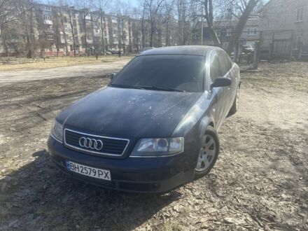 Синий Ауди А6, объемом двигателя 1.8 л и пробегом 400 тыс. км за 3200 $, фото 1 на Automoto.ua